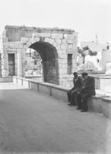 Roman arch of Marcus Aurelius Tripoli, Libya, North Africa 1956 with mosque minaret in background