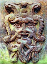 Old stone mask, face on a wall, Welf Castle of Herzberg, Herzberg am Harz, district of Göttingen,