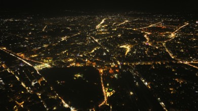 A Drone night view of Aleppo, Syria on December 19, 2025, showing illuminated streets, dense