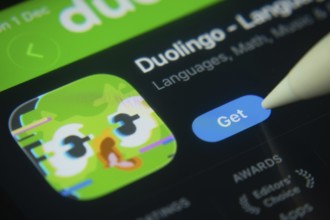Dhaka, Bangladesh- 01 Dec 2025: A close-up of the Duolingo app icon in the App Store on an iPad