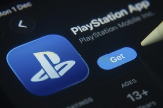 Dhaka, Bangladesh- 01 Dec 2025: A close-up of the PlayStation app icon in the App Store on an iPad