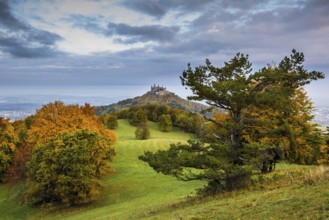 Castle and autumnal forest, Hohenzollern Castle, Hechingen, Swabian Jura, Baden-Württemberg,