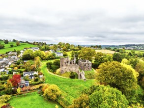 Autumn Colours over ruins of Grosmont Castle from a drone, Grosmont, Monmouthshire, Wales, UK