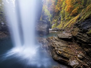 Waterfall mountain list in autumn-colored surroundings, Linthal, Klausenpass, Canton of Glarus,