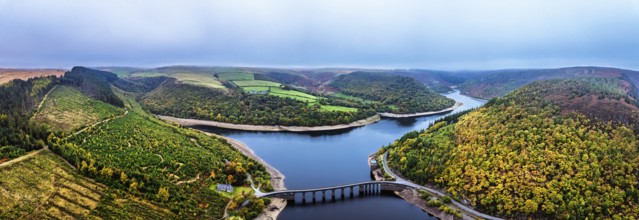 Autumn over Garreg Ddu Dam from a drone, Elan Valley, Caban-Coch Reservoir, Rhayader, Wales, UK