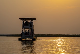 Tourist safari boat in Chobe River, Chobe Waterfront, Ihaha, Chobe National Park, Botswana