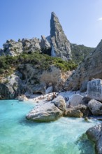 Light blue clear sea on a dream beach on Cala Goloritzé, picturesque rocky coast, steep coast with