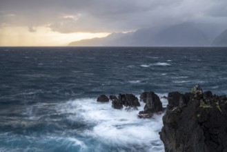 Sunrise, waves and rocks, coast near Porto Moniz, Madeira, Portugal