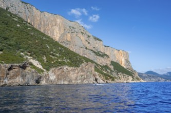 Picturesque rocky coast, cliffs and blue sea, Golfo di Orosei, Baunei, Sardinia, Italy