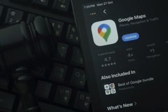 Dhaka, Bangladesh- 28 Oct 2025: An iPad displaying the Google Maps app against a judge's gavel and