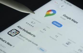 Dhaka, Bangladesh- 30 Oct 2025: Google maps app on a iPad screen with a pen pointing at the install