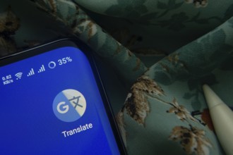 Dhaka, Bangladesh- 07 May 2025: Google Translate app icon is seen on smartphone