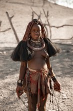 Young woman, Himba woman, traditional Himba village, Kaokoveld, Kunene, Namibia
