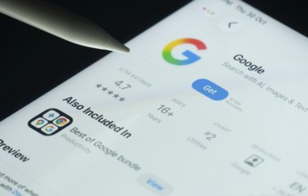 Dhaka, Bangladesh- 30 Oct 2025: Google app on a iPad screen with a pen pointing at the install