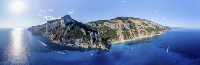 Panorama, picturesque rocky coast, cliffs with L'Aguglia pinnacle, blue sea and Cala Goloritzé