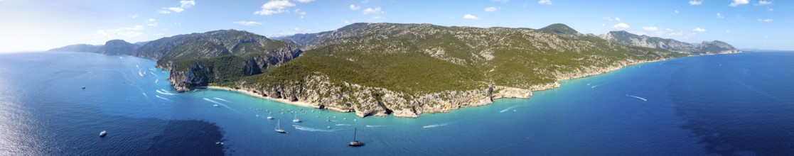 Panorama, picturesque rocky coast, cliffs and Cala Luna beach, aerial view, Golfo di Orosei,