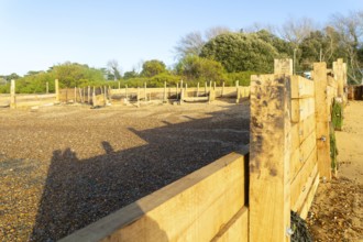 Temporary coastal defences erected by Bawdsey Haven Yacht Club, response to rapid erosion beach