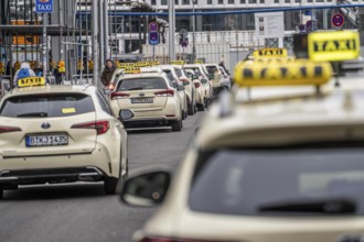 Taxis in front of the main train station in Berlin, waiting in line for passengers, Germany