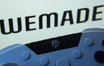 Dhaka, Bangladesh- 14 Nov 2025: A close-up of a gamepad with the WeMade Entertainment seen on