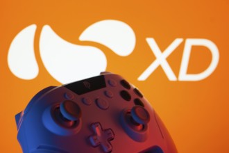 Dhaka, Bangladesh- 14 Nov 2025: A close-up of a gamepad with the XD seen on screen in the