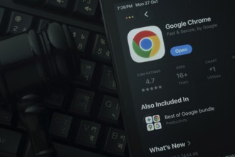 Dhaka, Bangladesh- 28 Oct 2025: An iPad displaying the Google Chrome app against a judge's gavel