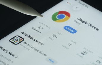 Dhaka, Bangladesh- 30 Oct 2025: Google Chrome app on a iPad screen with a pen pointing at the