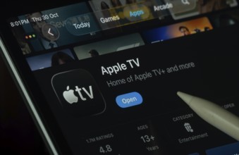 Dhaka, Bangladesh- 30 Oct 2025: Apple TV app displayed on a iPad screen in dark mode with a digital