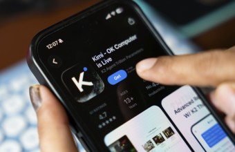 In this photo illustration, a person uses the Kimi AI chatbot on a smartphone, in New Delhi, India