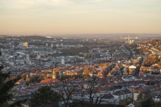 View of the city center in warm sunset light from Santiago de Chile Platz Stuttgart, Germany
