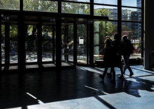 Foyer in a building of the Technical University of Berlin, light and shadow from people at the