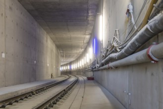 Construction work on the airport tunnel at the airport tunnel. The last few meters of solid road