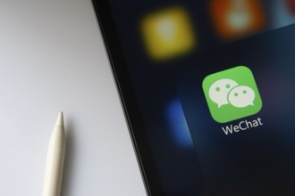 Dhaka, Bangladesh- 18 March 2025: A close up of an iPad screen displaying the WeChat app