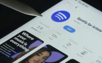 Dhaka, Bangladesh- 30 Oct 2025: Spotify for Artists app on a iPad screen with a pen pointing at the