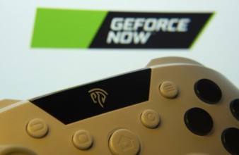 Dhaka, Bangladesh- 14 Nov 2025: A close-up of a gamepad with the Geforce Now seen on screen in the