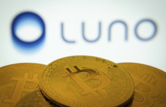 Dhaka, Bangladesh- 03 Sep 2025: Close-up of Bitcoin coins with the Luno logo visible on a screen in