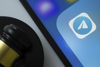 Dhaka, Bangladesh- 09 Feb 2025: A close up of an iPad screen displaying the Telegram app alongside