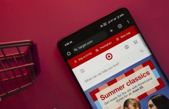 Dhaka, Bangladesh- 23 June 2025: A smartphone displaying the Target website with a shopping cart is