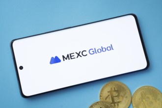 Dhaka, Bangladesh - 04 April 2025: The logo of MEXC Global is displayed on a smartphone screen