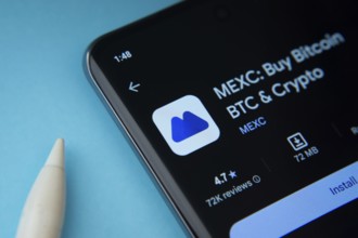 Dhaka, Bangladesh- 09 March 2025: MEXC app from Google Playstore is displayed on a smartphone