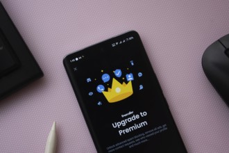 Dhaka, bangladesh- 16 March 2025: A smartphone screen featuring the upgrade to premium Truecaller