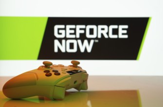 Dhaka, Bangladesh- 14 Nov 2025: A close-up of a white gamepad with the Geforce Now seen on screen