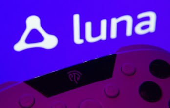 Dhaka, Bangladesh- 14 Nov 2025: A close-up of a gamepad with the Amazon Luna seen on screen in the