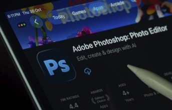 Dhaka, Bangladesh- 30 Oct 2025: Adobe Photoshop app displayed on a iPad screen in dark mode with a