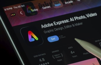 Dhaka, Bangladesh- 30 Oct 2025: Adobe Express app displayed on a iPad screen in dark mode with a