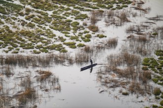 Marshland, marshland, Kavango fishermen with dugout boat, Mokoro, aerial view, Okavango Delta,