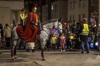 Martinszug in Essen-Rüttenscheid, the parish of St. Lambertus, Saint Martin actor on a horse, with