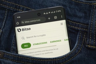 Dhaka, Bangladesh- 15 June 2025: A smartphone displaying the Bitso.com web interface peeks out of a