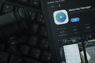 Dhaka, Bangladesh- 28 Oct 2025: An iPad displaying the meta ads manager app against a judge's gavel