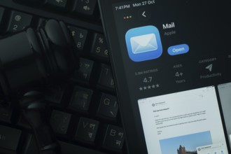 Dhaka, Bangladesh- 28 Oct 2025: An iPad displaying the Apple Mail app against a judge's gavel and