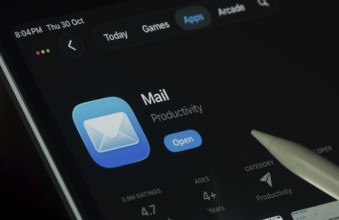 Dhaka, Bangladesh- 30 Oct 2025: Apple Mail app displayed on a iPad screen in dark mode with a